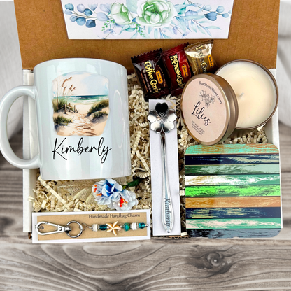 gift basket with a personalized beach vibes coffee mug, engraved spoon, vibrant coaster, scented candle, artisan charm, and coffee treats for women’s presents