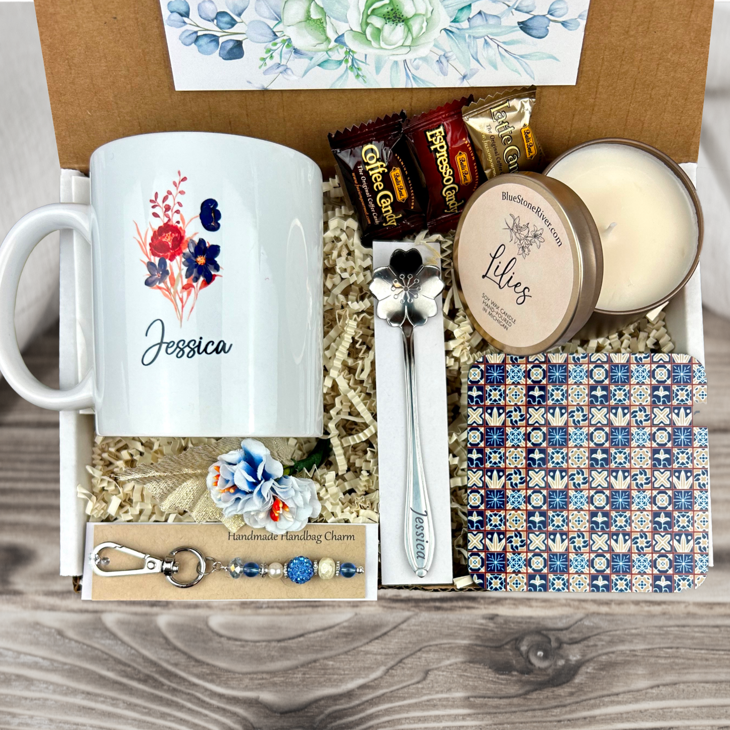 gift basket with a personalized succulent coffee mug, engraved spoon, vibrant coaster, scented candle, artisan charm, and coffee treats for women’s