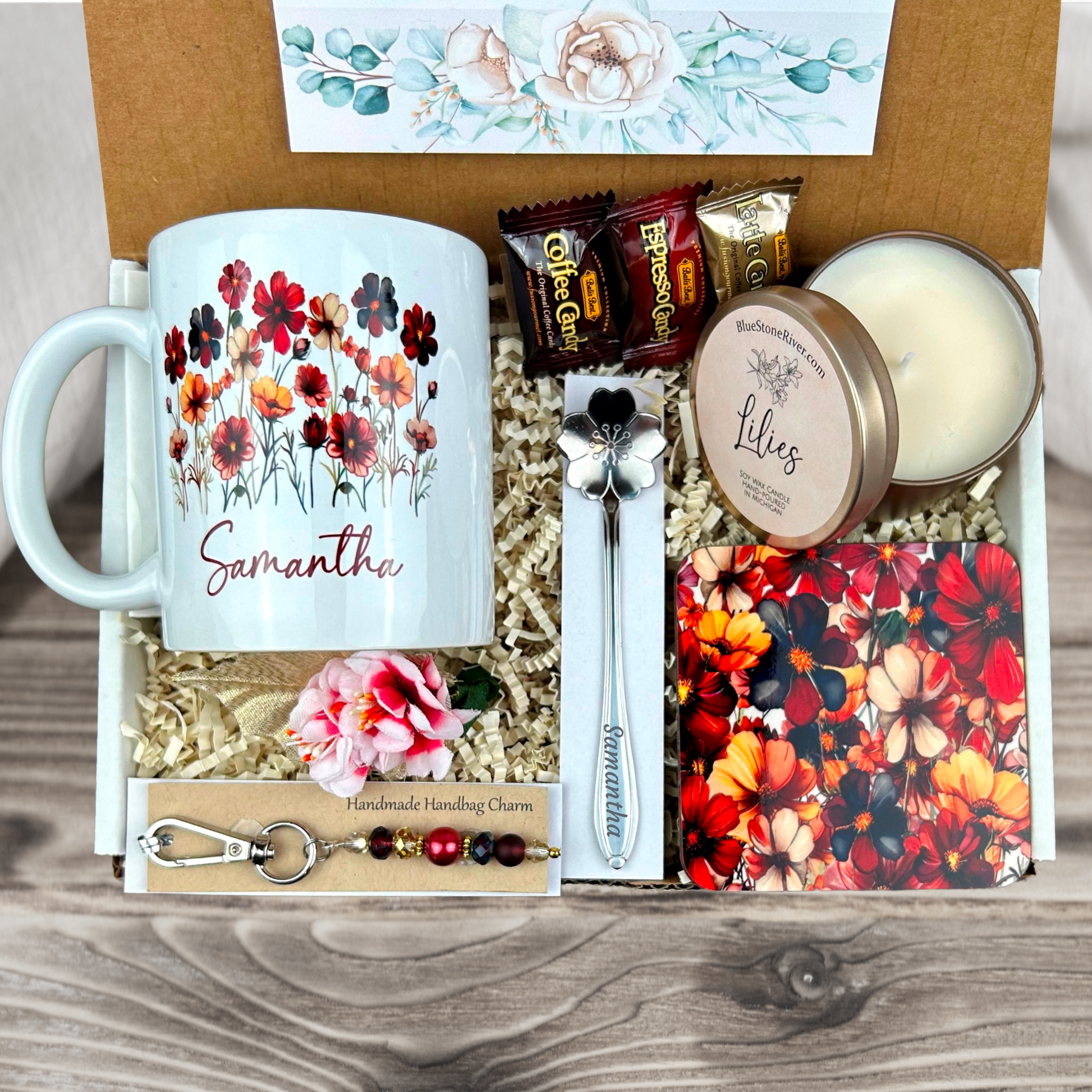 gift basket with a personalized wildflower coffee mug, engraved spoon, vibrant coaster, scented candle, artisan charm, and coffee treats for women’s holiday presents