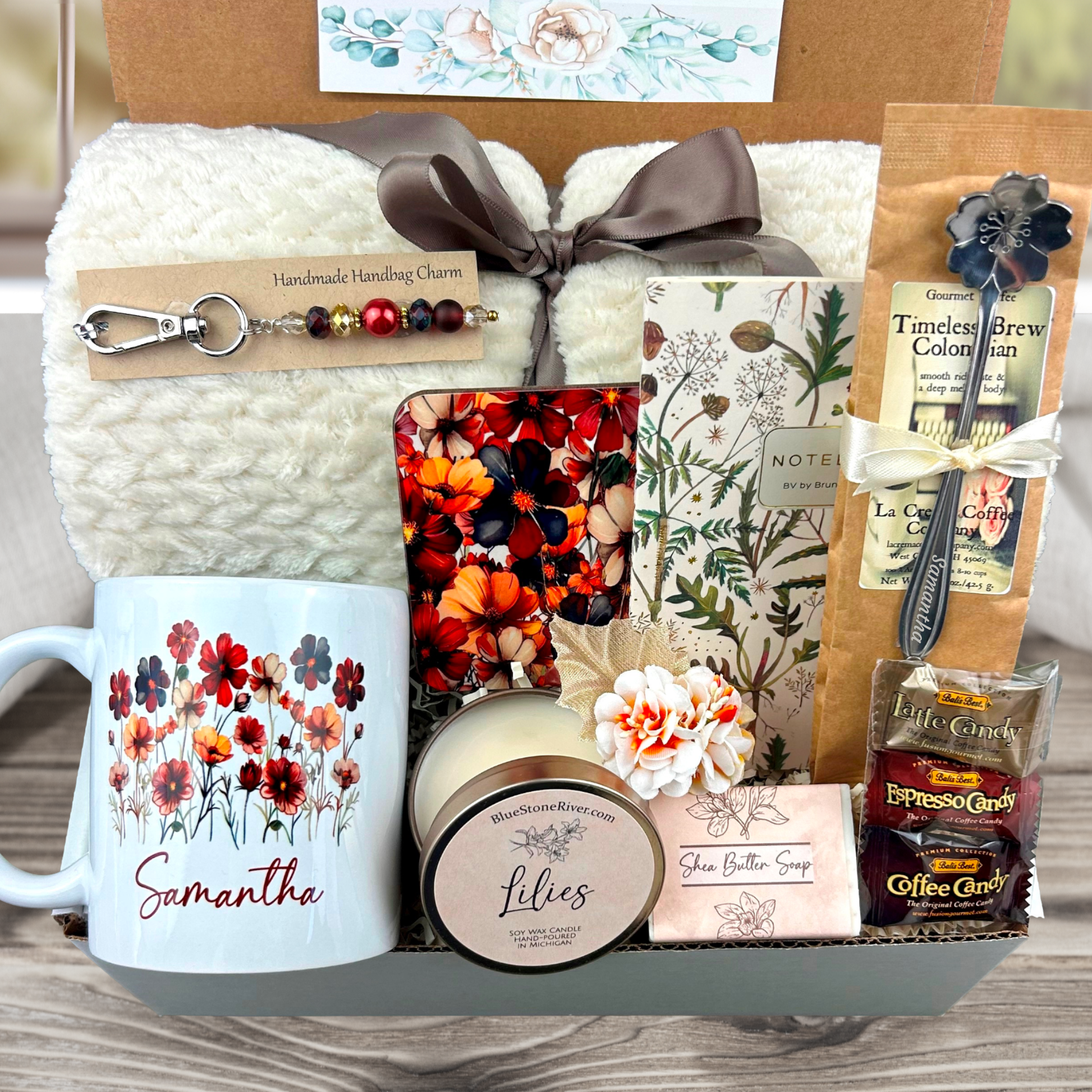 Retirement Gift Box with Blanket, personalized mug, engraved spoon, purse charm, coffee, candy, candle, notebook, soap and coaster in a wild flower design