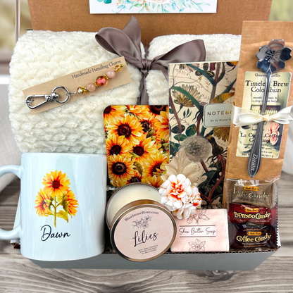 Retirement Gift Box with Blanket, personalized mug, engraved spoon, purse charm, coffee, candy, candle, notebook, soap and coaster in a sunflower design